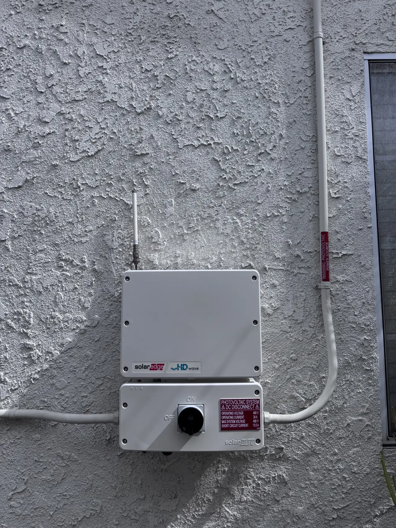 Closed solar disconnect enclosure on an exterior wall, North Hollywood