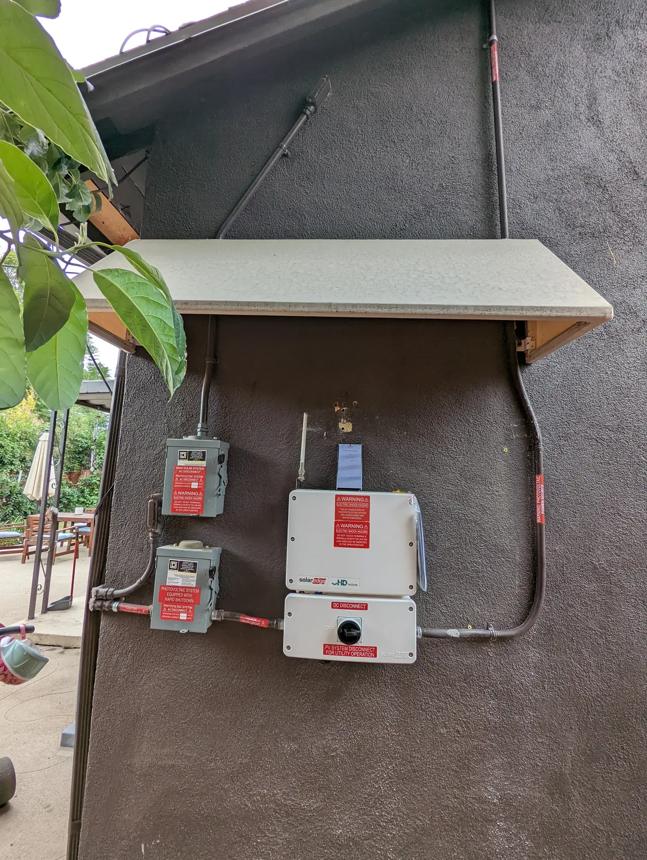Solar disconnects and equipment mounted on an exterior wall, North Hollywood