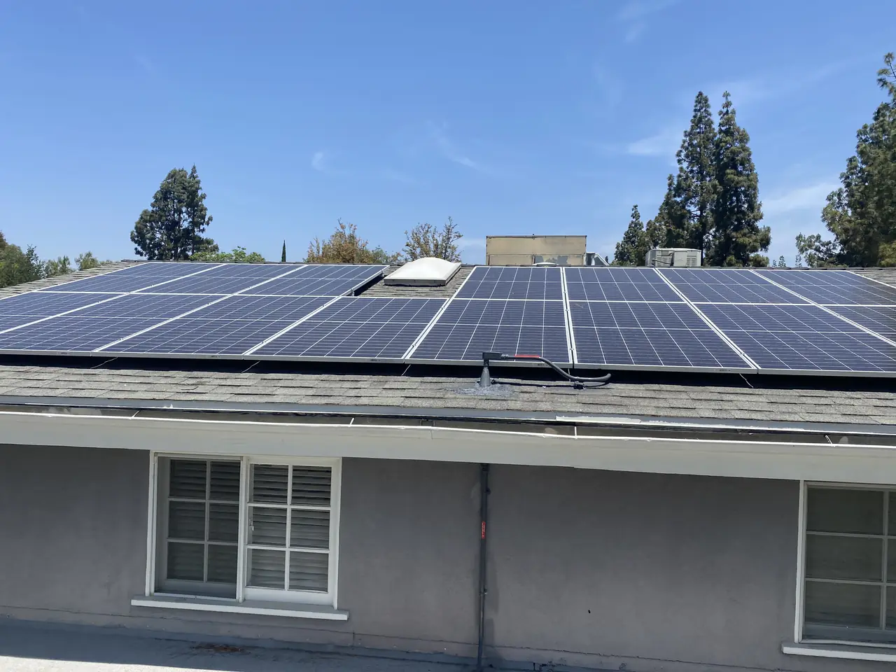 Twenty-six REC panels on a composition-shingle roof in Northridge