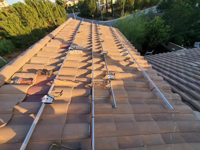 6.4 kW solar panel array on a rooftop in Northridge, CA