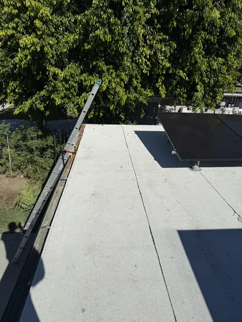 5.41 kW solar panel array on a flat roof in Northridge, CA