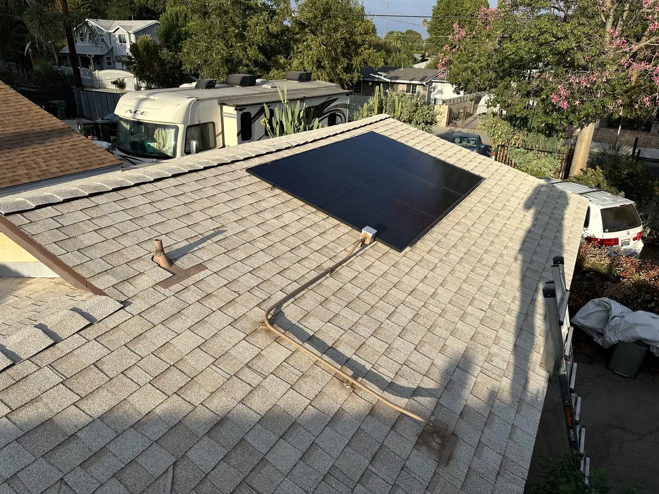 Solar panel mounting detail on a rooftop in Northridge, CA