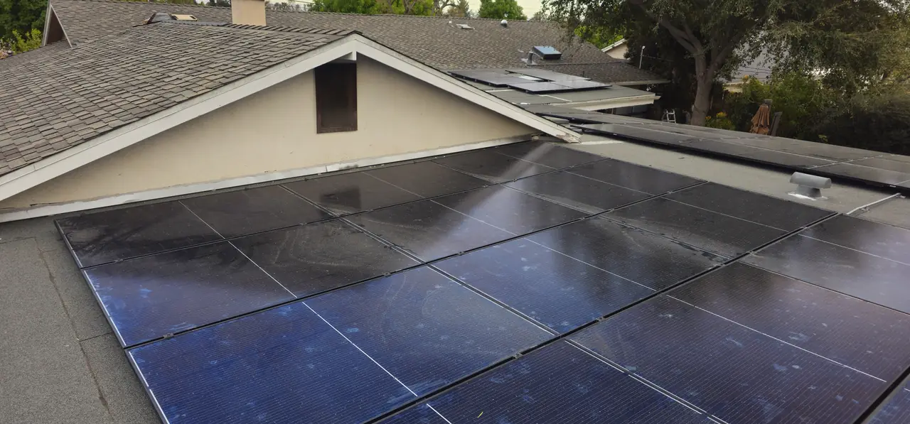 Solar modules across a hip roof beside a gable, Northridge