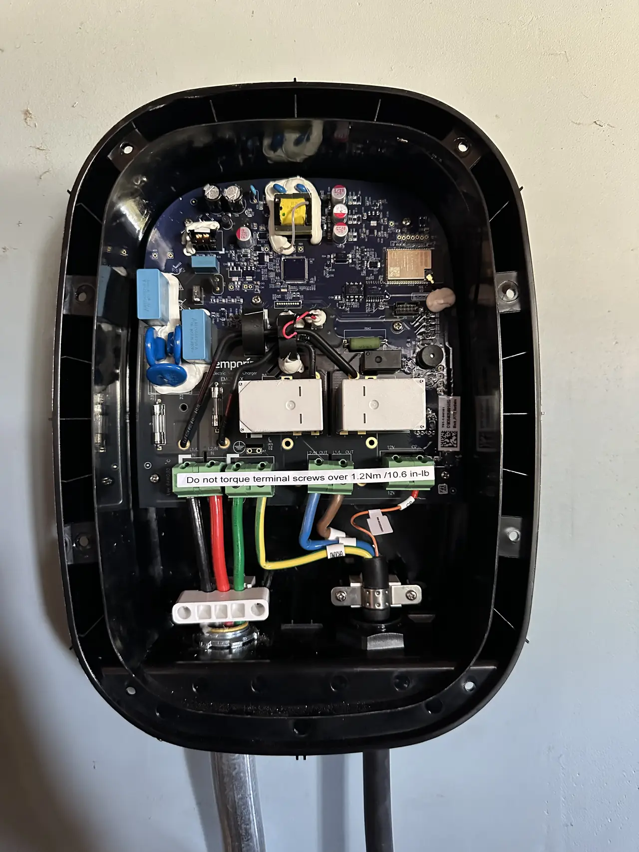 Electric vehicle charger opened for wiring, Northridge