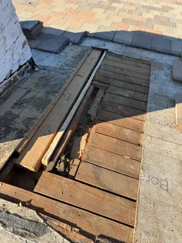 Roof deck opened with sheathing removed and rafters exposed, Northridge