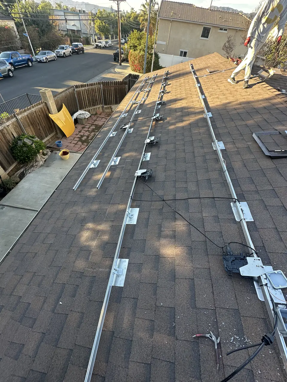 All-black solar array on a long pitched shingle roof in Pacoima