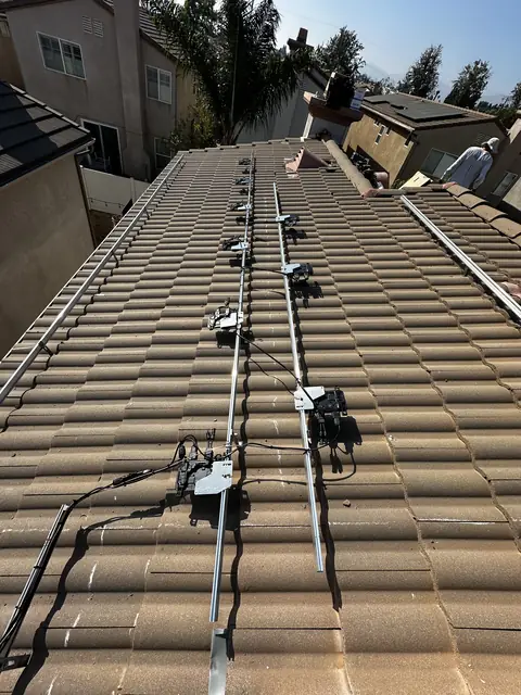 Solar panel mounting detail on a tile roof in Pacoima, CA