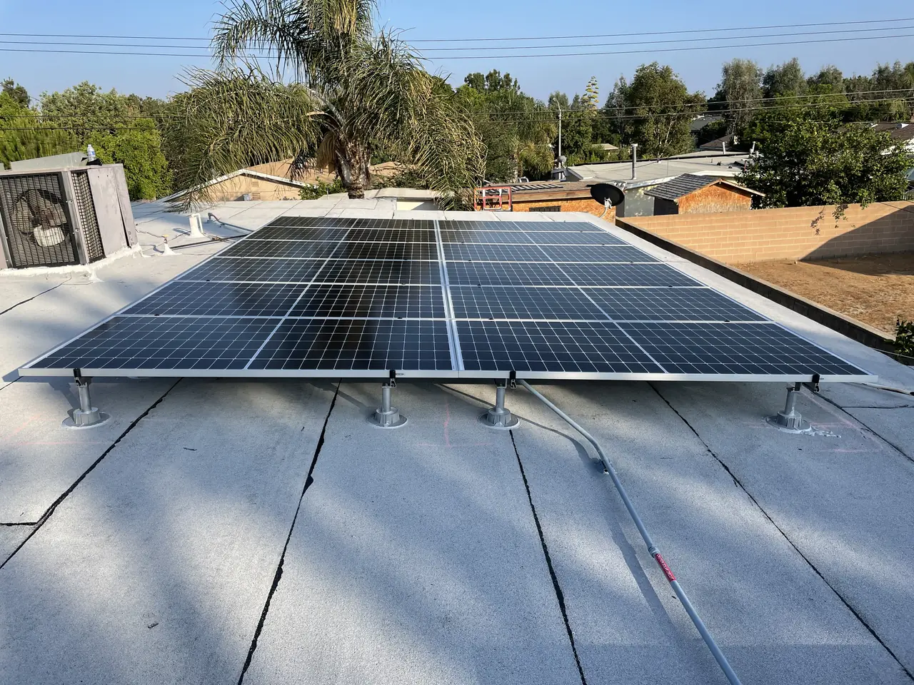 Solar panel mounting detail on a flat roof in Pacoima, CA