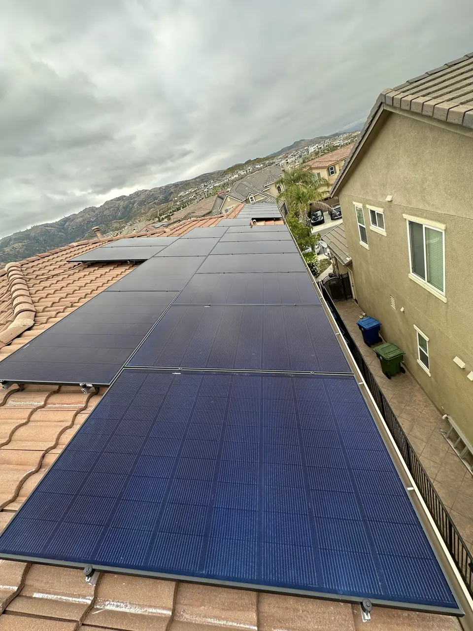 Cali Energy solar installation with REC Alpha panels on a tile roof in Porter Ranch, California