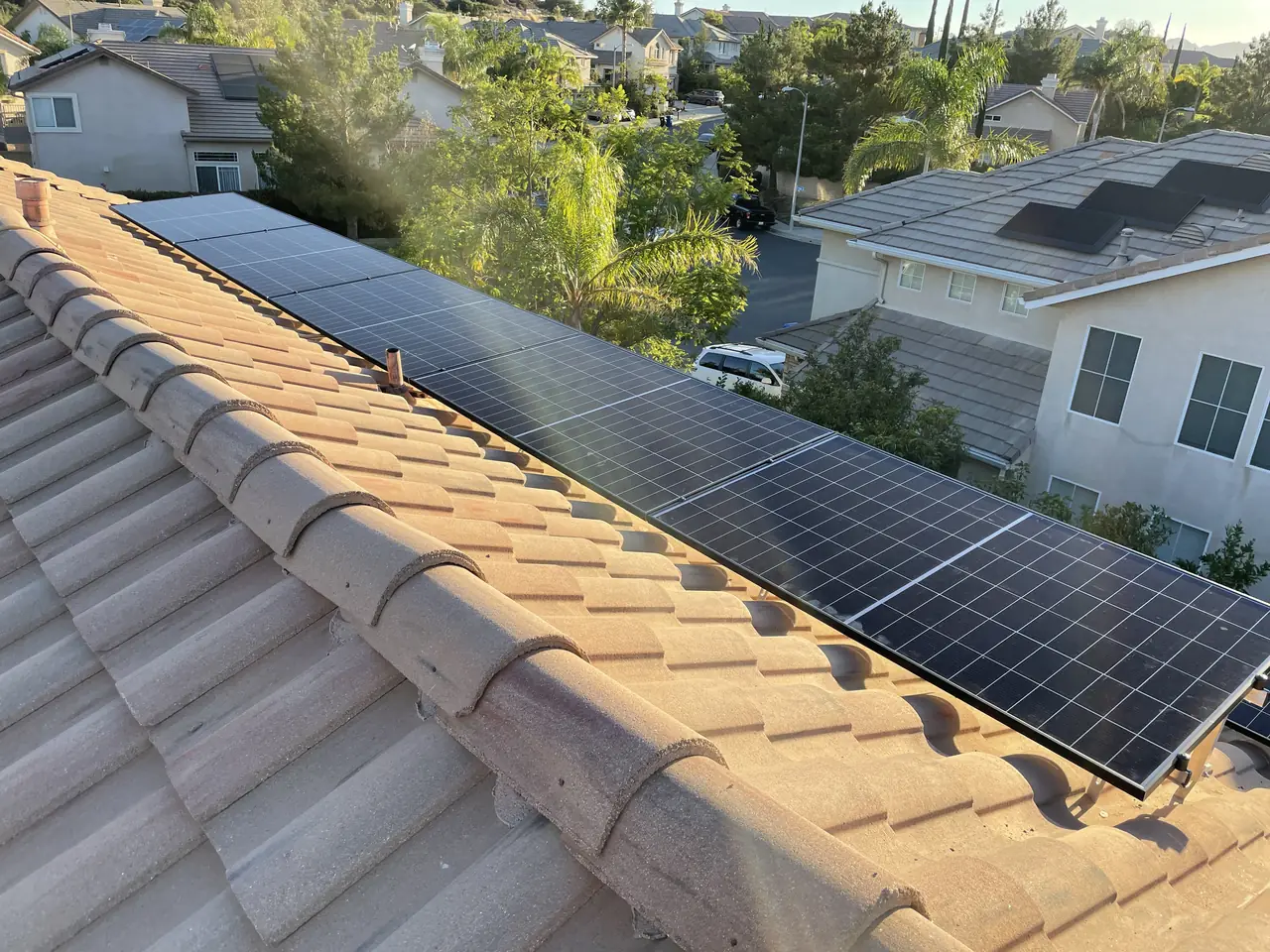 A solar array running along the length of a tile roof, Porter Ranch