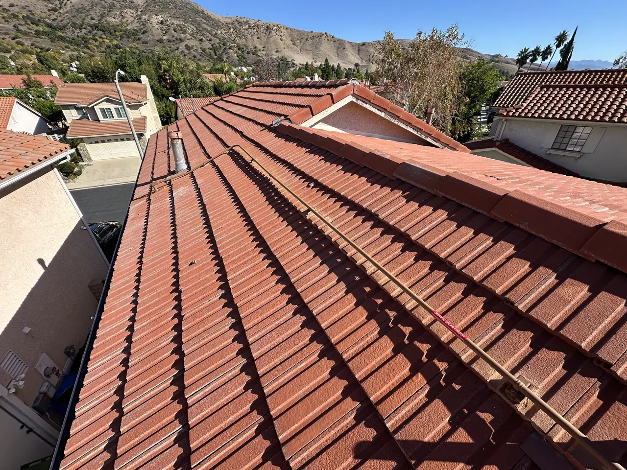 A red tile roof along the ridge with the hills beyond, Porter Ranch