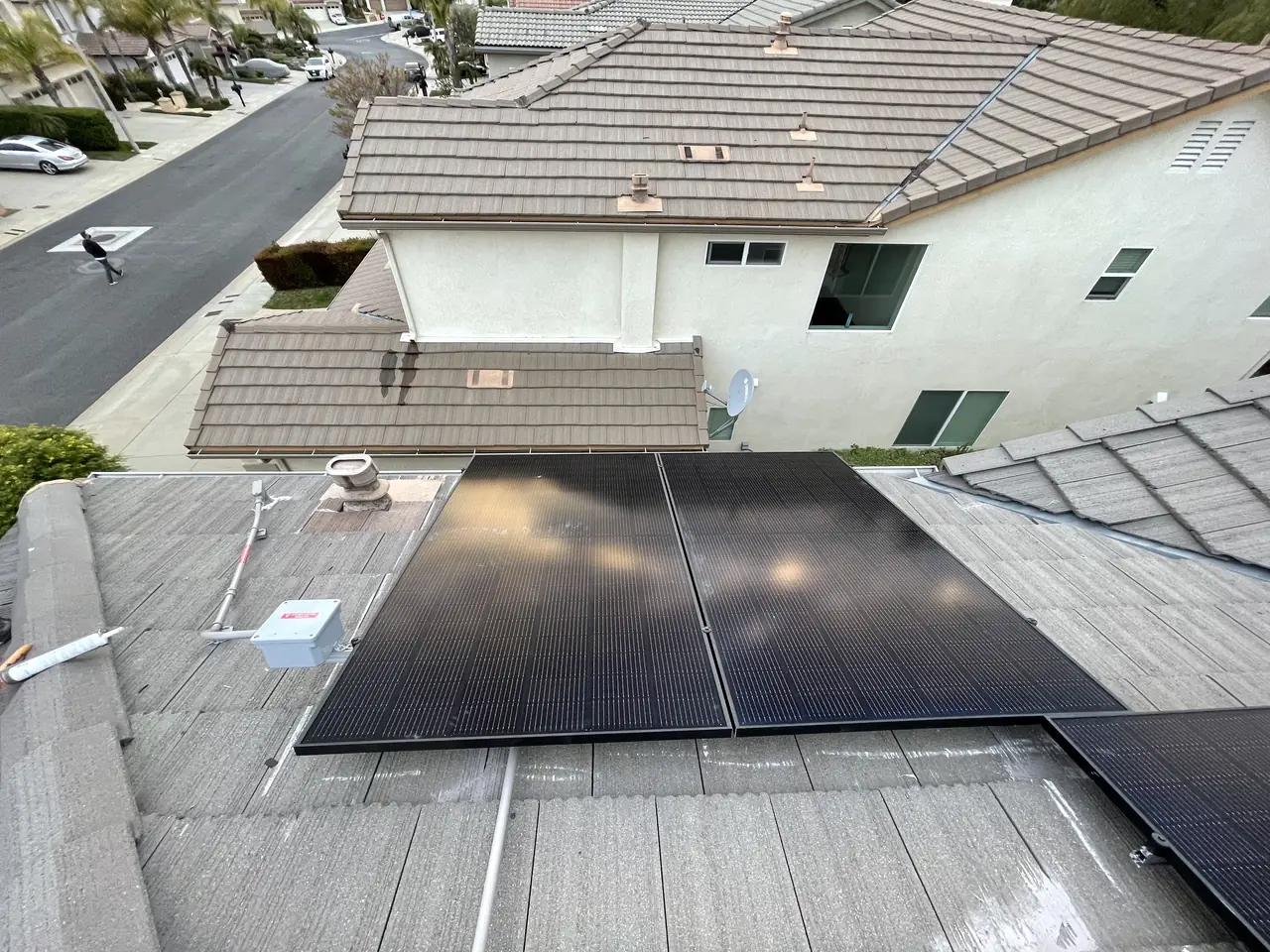 The edge of a solar array where the modules meet the tile, Porter Ranch