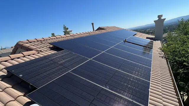 A solar array on a tile roof above the neighborhood, Porter Ranch