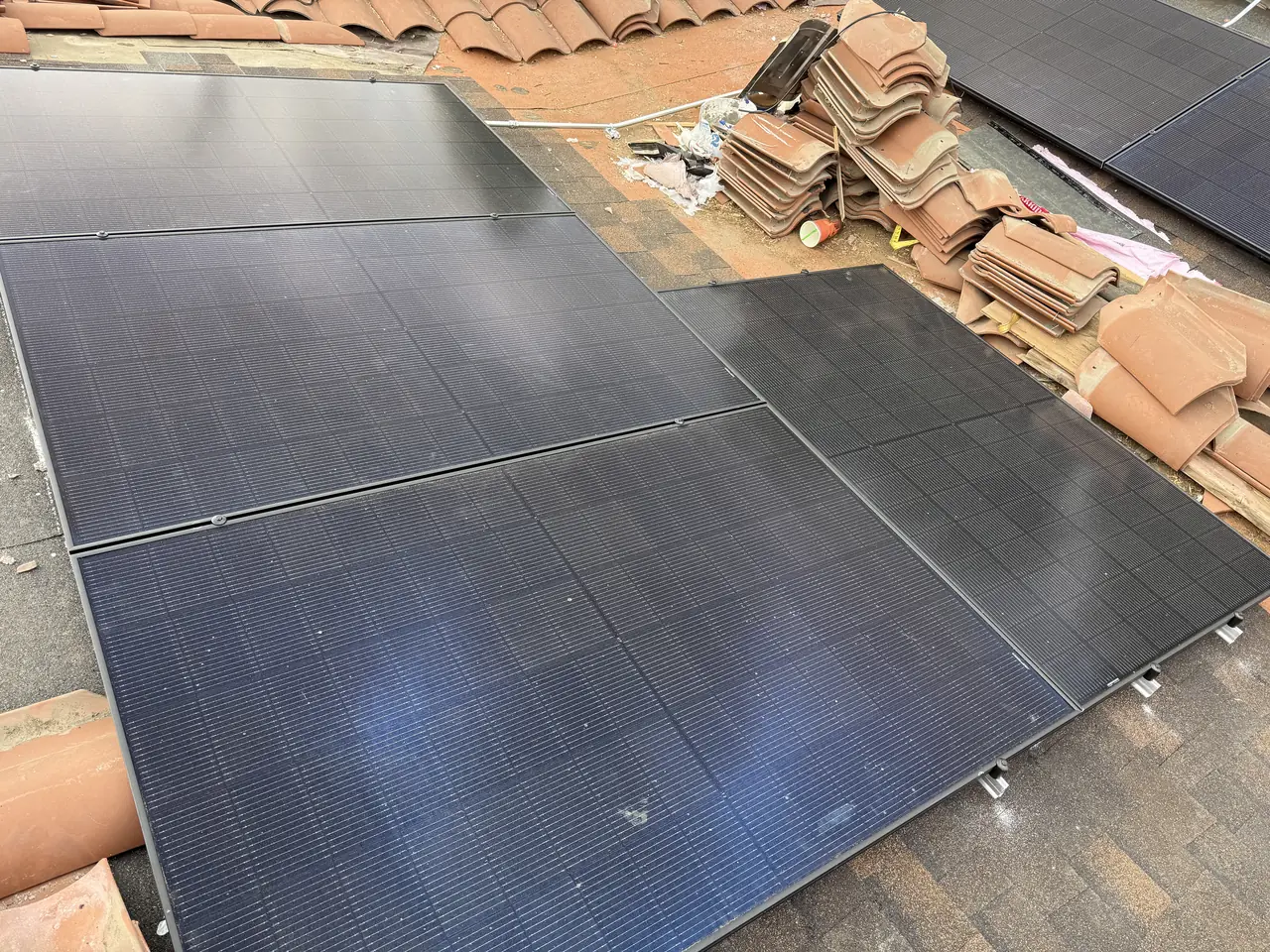 7.34 kW solar panel array on a tile roof in Reseda, CA