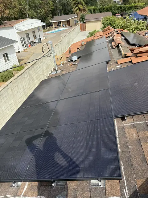 Solar panel mounting detail on a tile roof in Reseda, CA