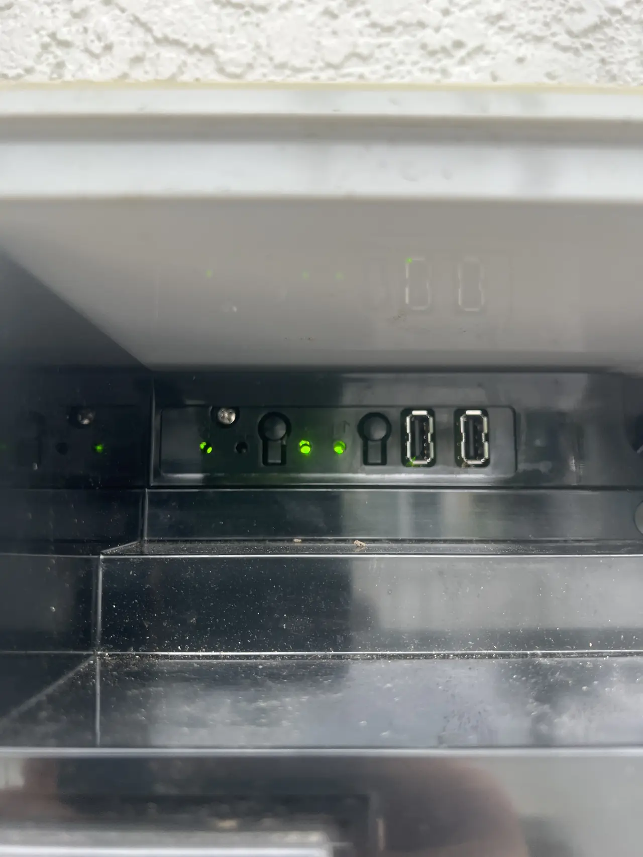 Close view of the gateway inside the combiner enclosure showing small green status lights, Reseda