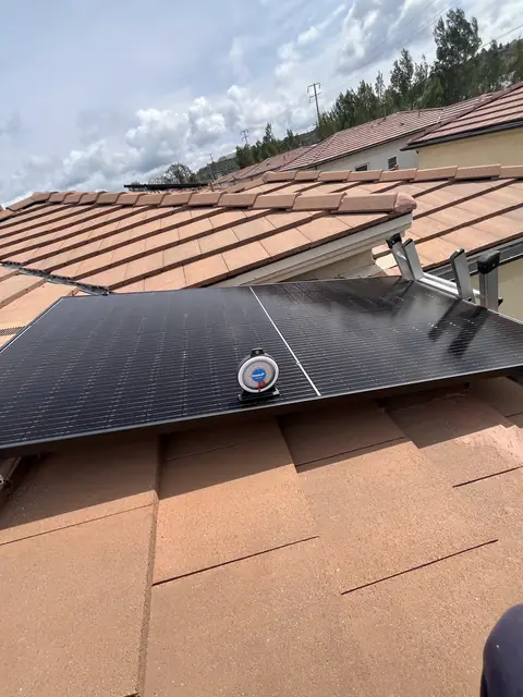 Solar panel mounting detail on a tile roof in Santa Clarita, CA
