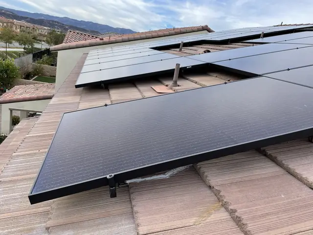 Solar panel mounting detail on a tile roof in Santa Clarita, CA