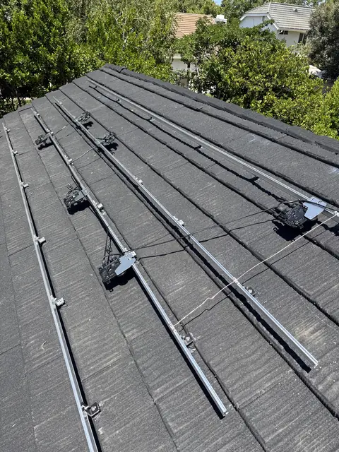Solar panel mounting detail on a tile roof in Santa Clarita, CA