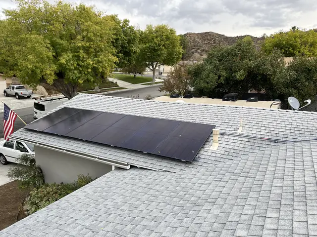 Solar panel mounting detail on a composition shingle roof in Santa Clarita, CA
