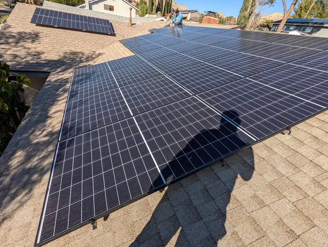 Solar panel mounting detail on a composition shingle roof in Santa Clarita, CA