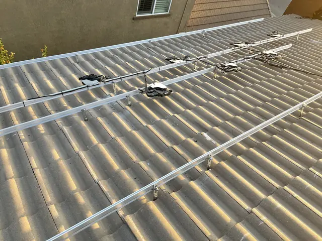Solar panel mounting detail on a tile roof in Santa Clarita, CA