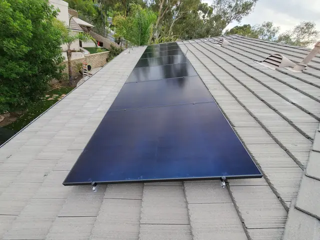 Solar panel mounting detail on a tile roof in Santa Clarita, CA