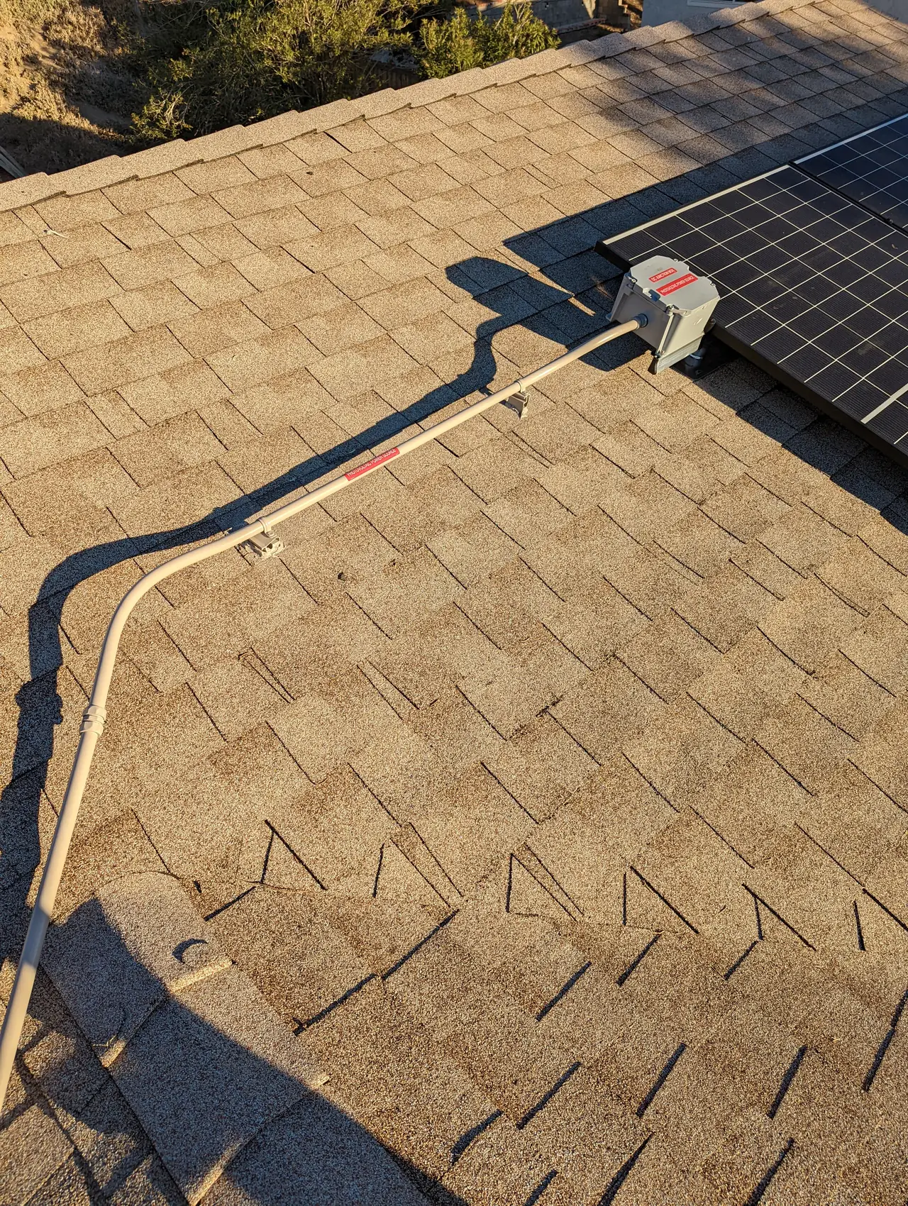 Conduit crossing a new shingle ridge toward the array, Santa Clarita