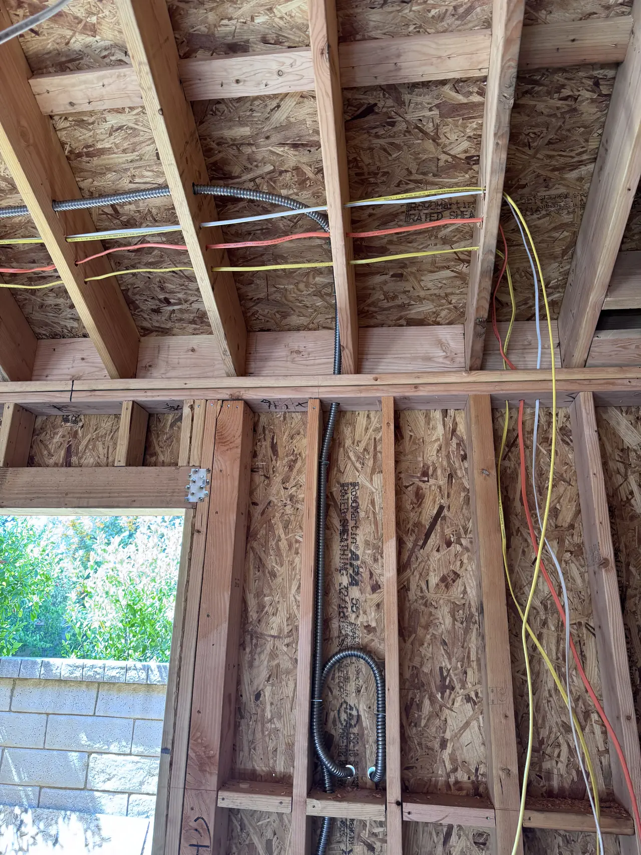 The interior framing of a new accessory dwelling before drywall, Santa Clarita