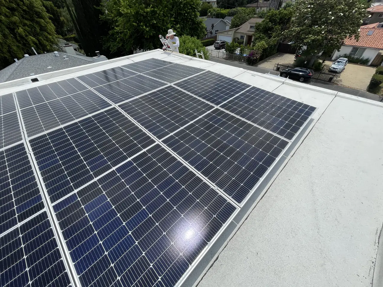 3.25 kW solar panel array on a flat roof in Sherman Oaks, CA