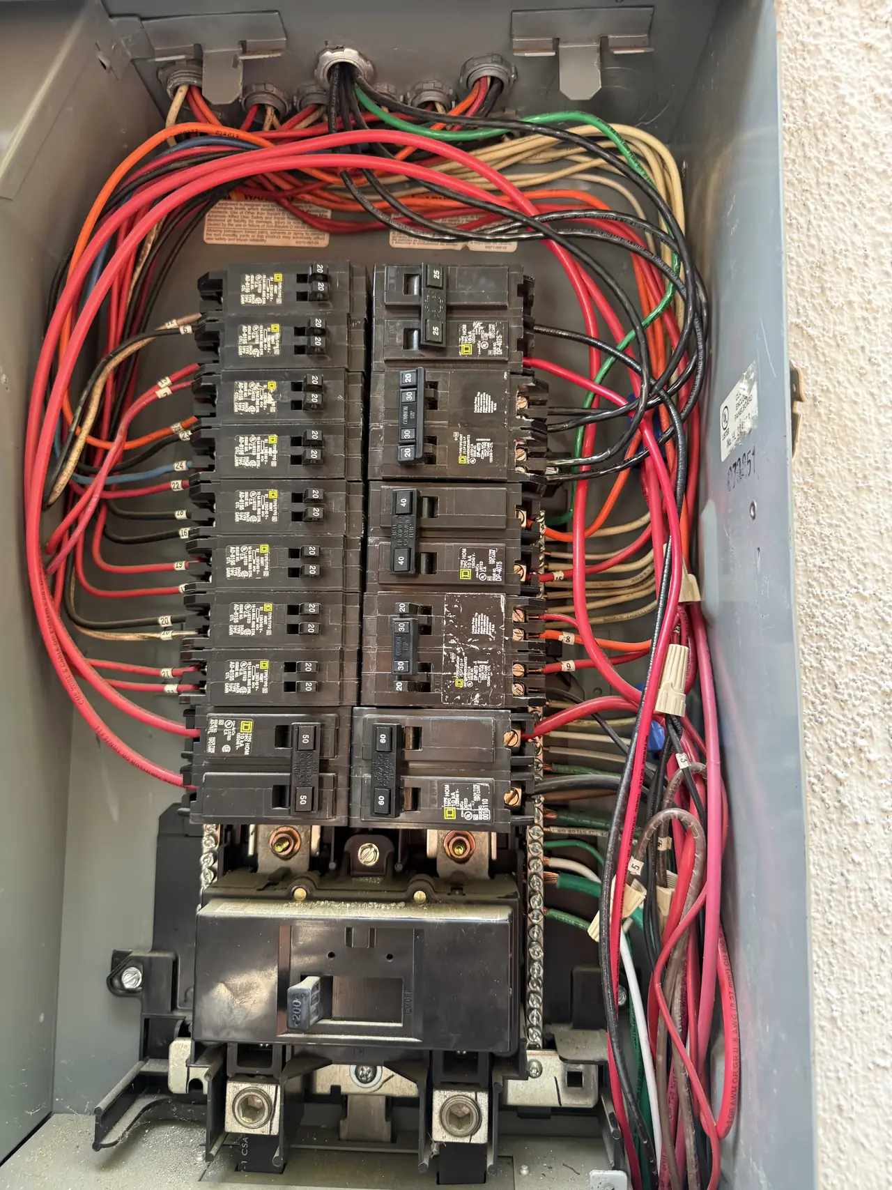 Open service panel with breakers and conductors, Sherman Oaks