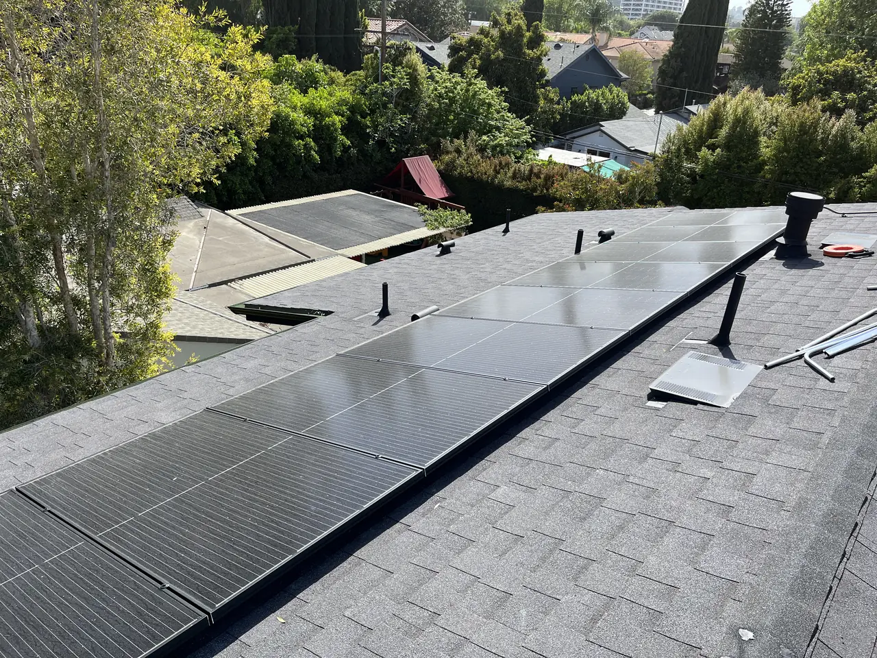 Solar modules along the ridge of a composition shingle roof, Sherman Oaks