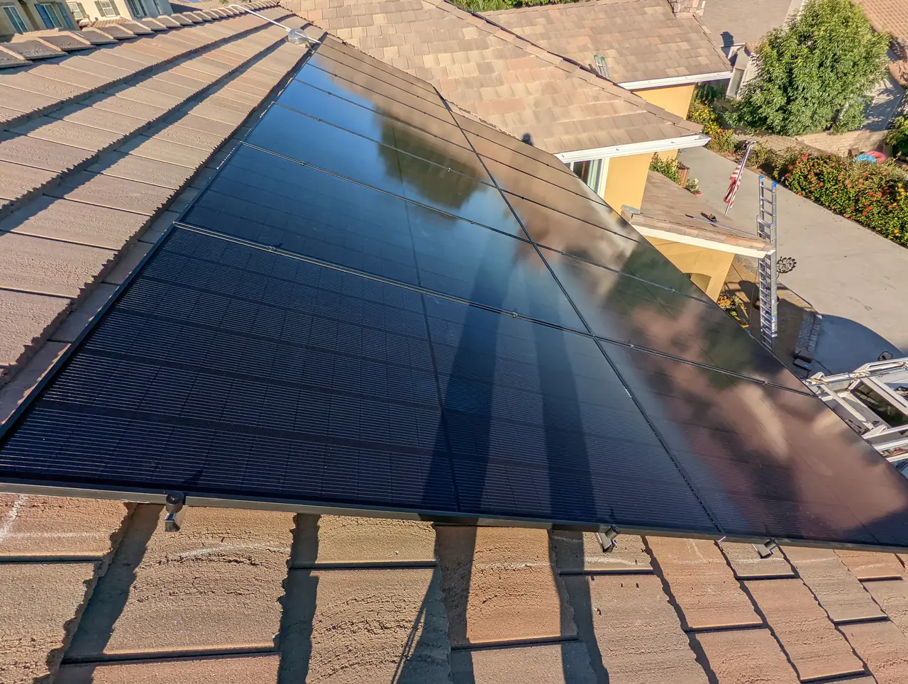 Thirty-two REC panels with Enphase microinverters on a tile roof in Simi Valley