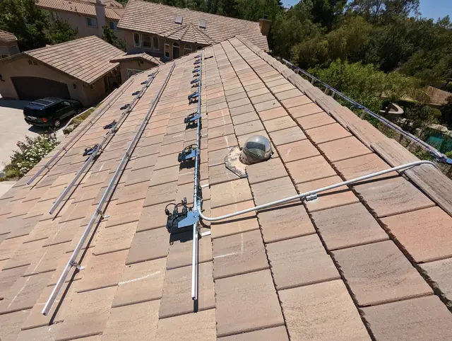 Solar panel mounting detail on a tile roof in Simi Valley, CA