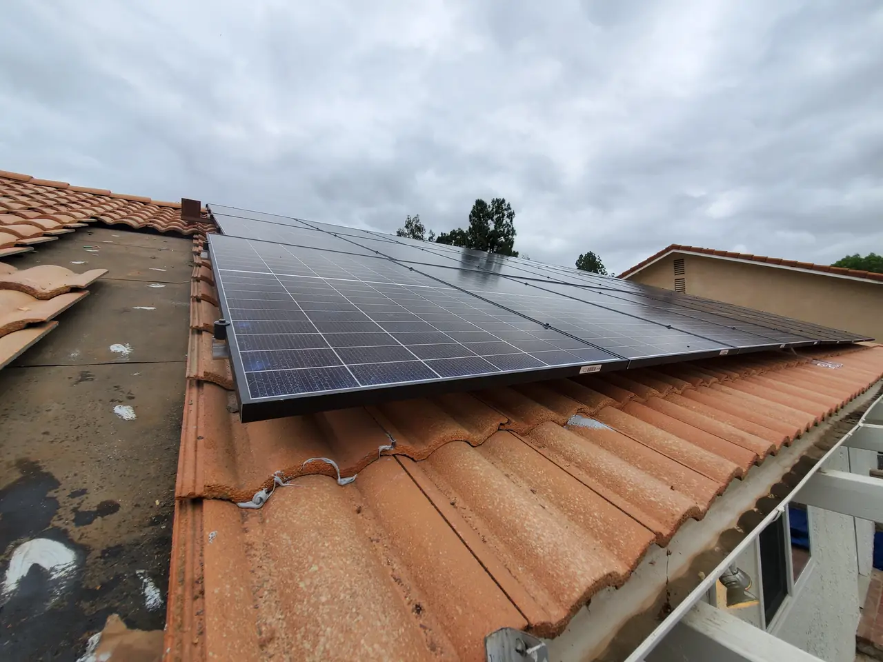 Solar modules installed along the edge of a concrete tile roof in Simi Valley