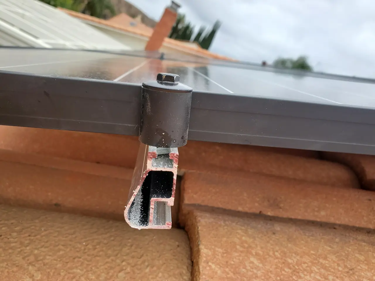 Mounting standoff brought up through a concrete tile roof in Simi Valley and sealed