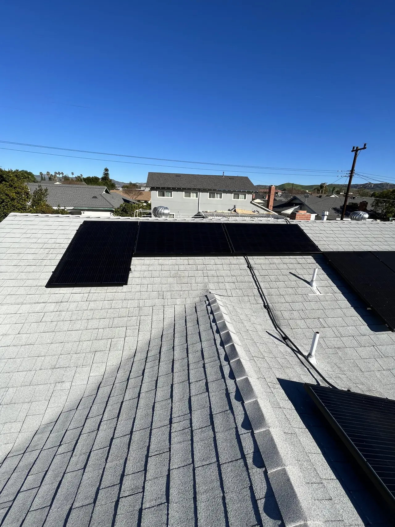 Completed solar array on a Simi Valley roof seen along the slope