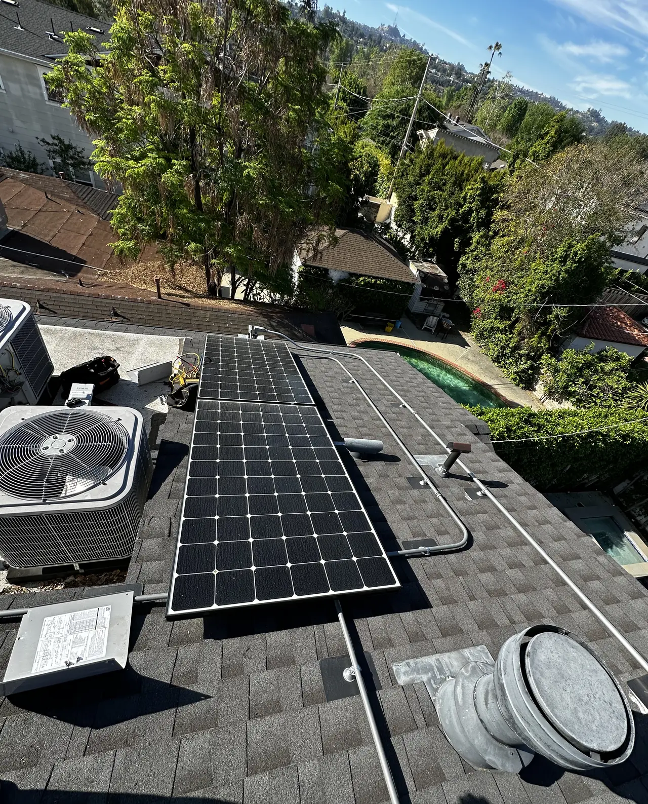 A hundred square feet of roof, and the array had to come off first