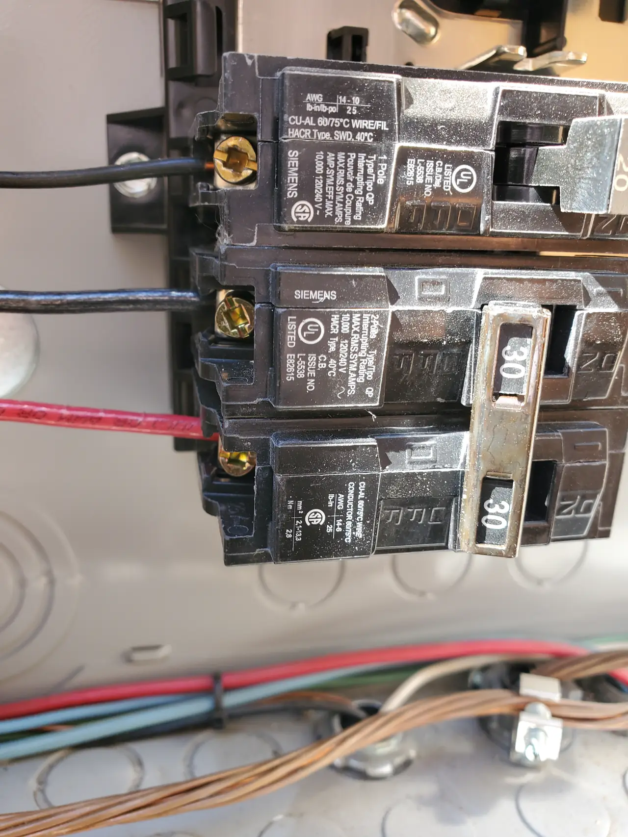 Open combiner enclosure with breakers and conductors, Sun Valley