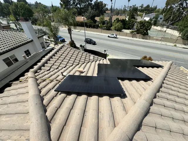 Solar panel mounting detail on a tile roof in Tarzana, CA