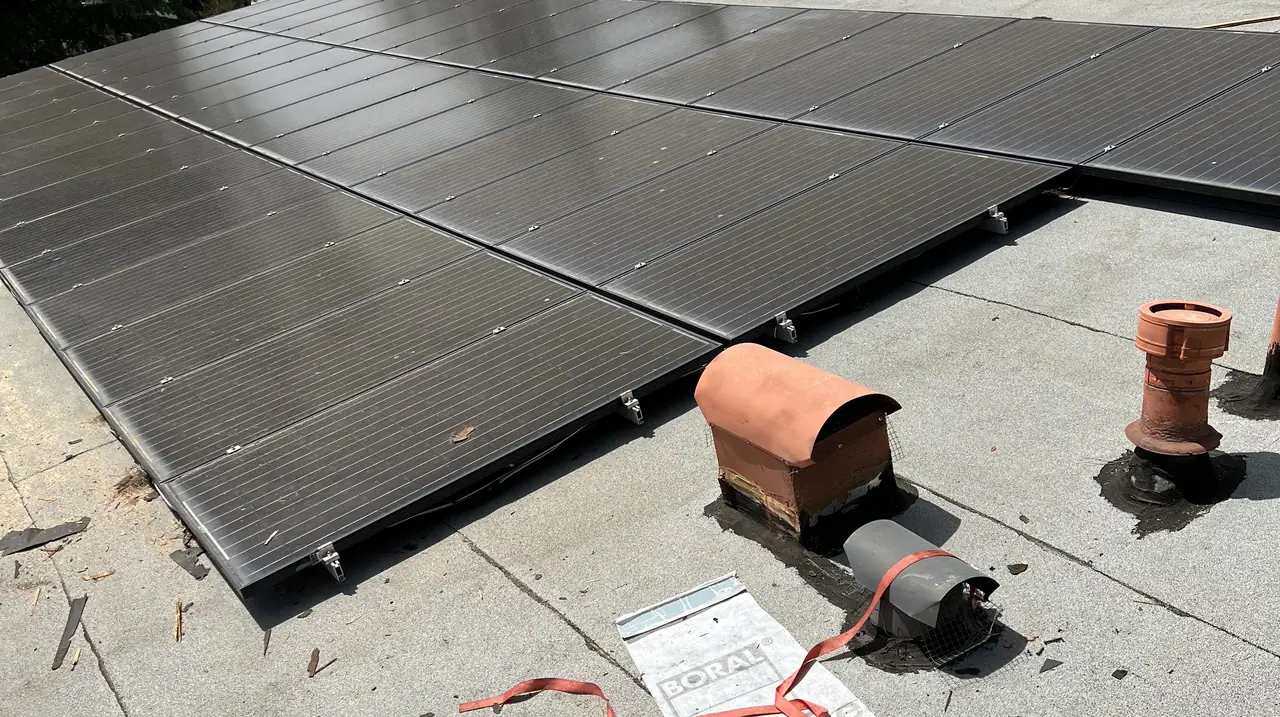 The old array came off with the roof. What went back was twice the system