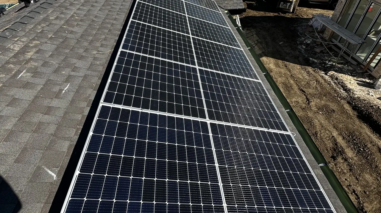 Two new houses, one owner, and the solar the code asked for