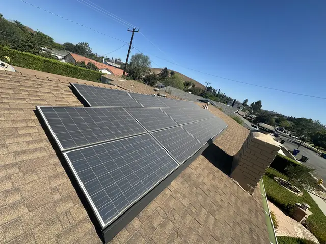 Solar panel mounting detail on a composition shingle roof in Thousand Oaks, CA