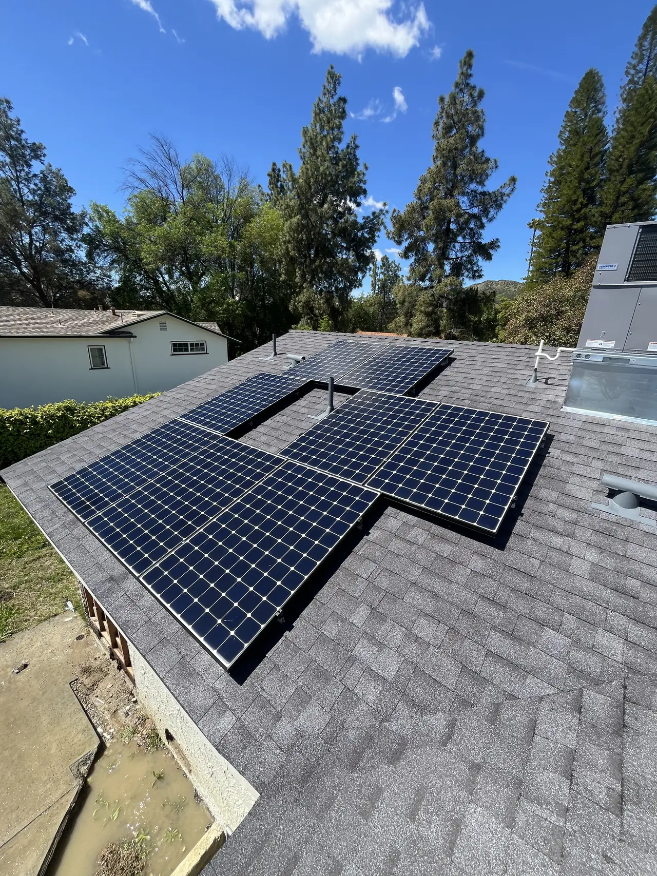 The roof was already full. The array went around it