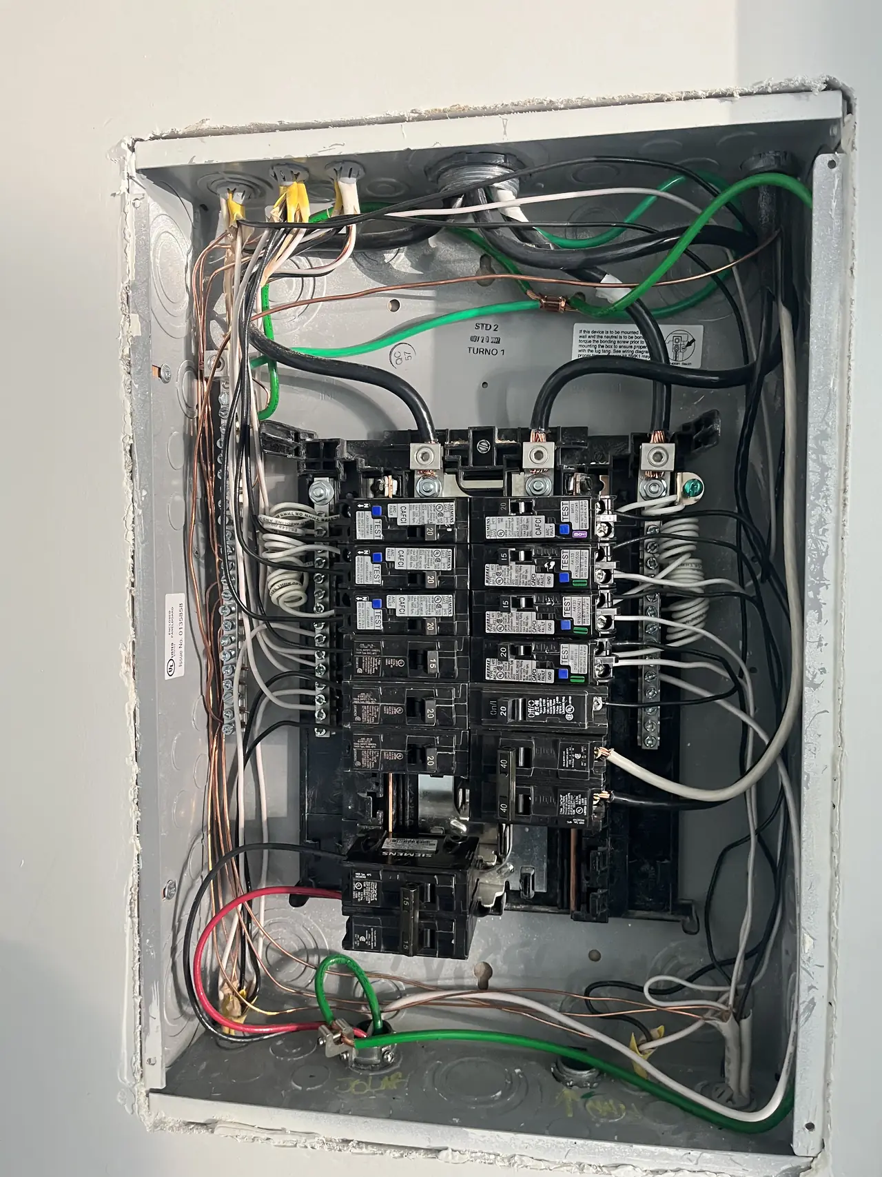 Open load centre with breakers and wiring, West Hills
