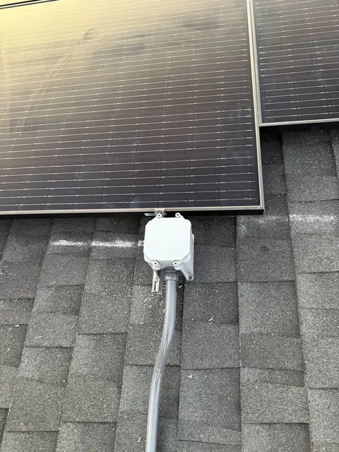 Solar panel mounting detail on a composition shingle roof in Whittier, CA