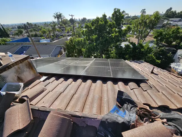 Solar panel mounting detail on a tile roof in Whittier, CA