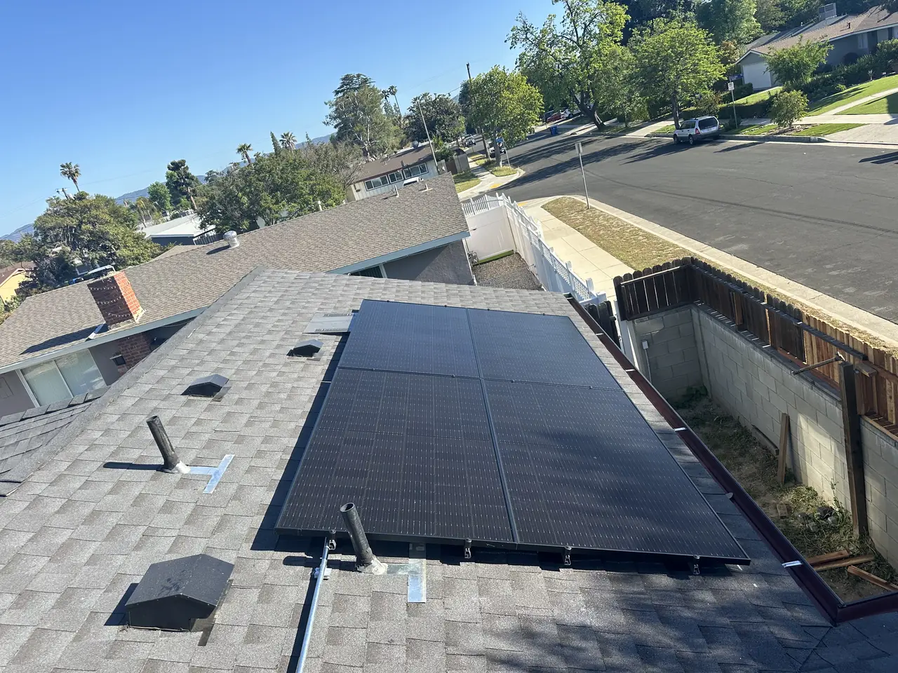 Small solar array on the roof of a detached unit, Winnetka