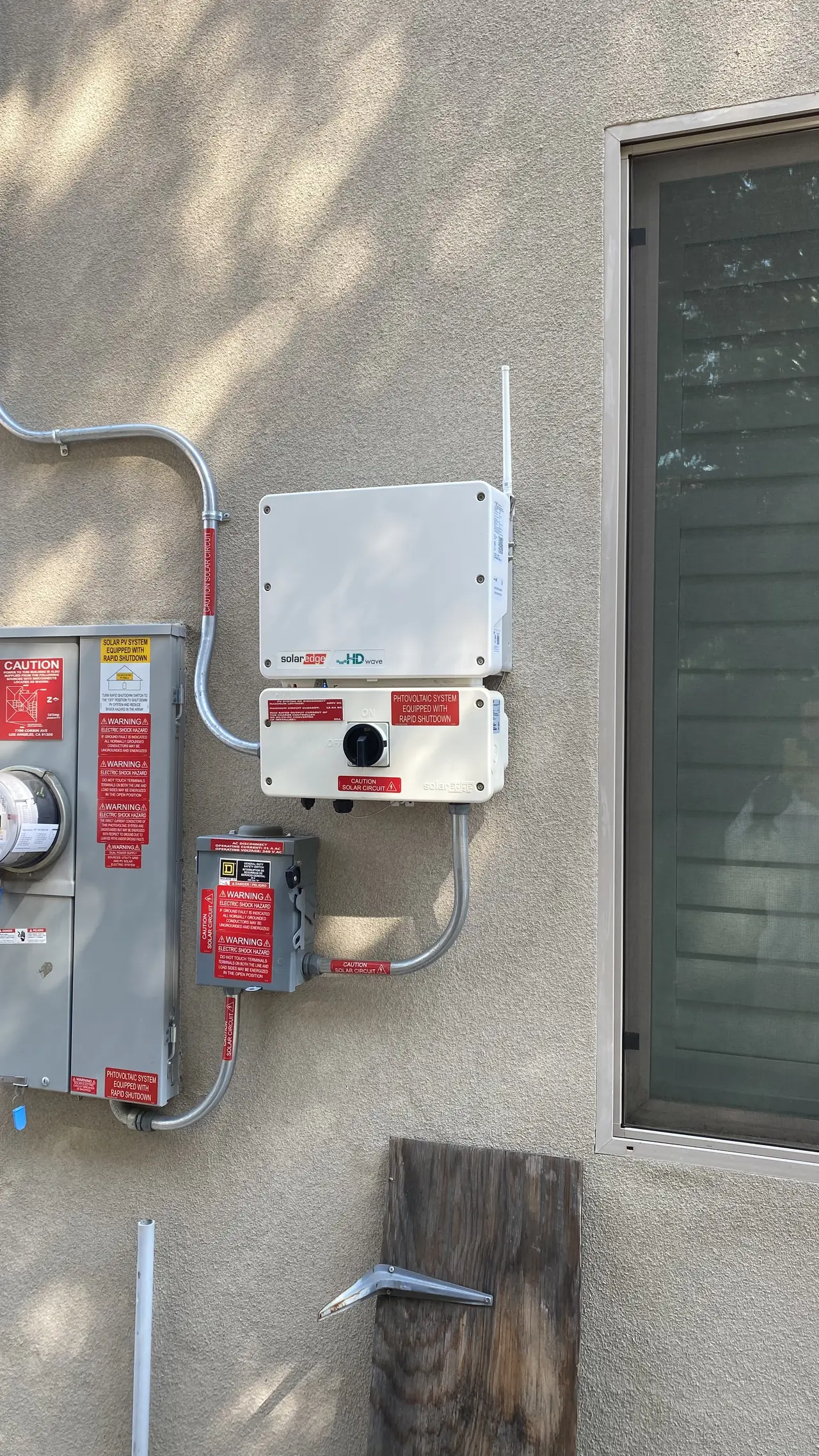 Rapid shutdown device mounted on an exterior wall, Winnetka
