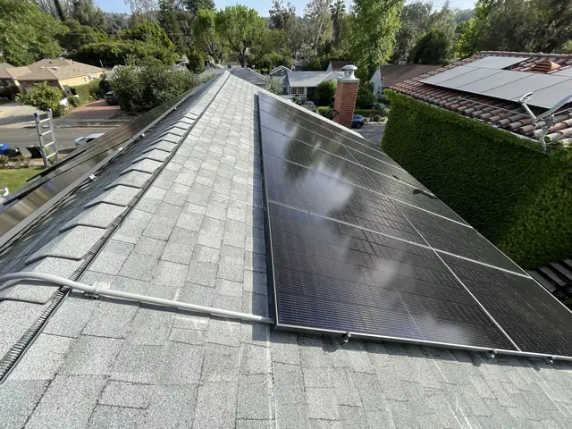 5.5 kW solar panel array on a rooftop in Woodland Hills, CA